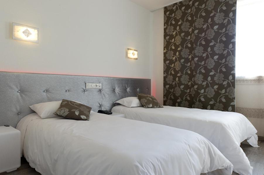 Logis Hotel Et Spa Chez Camillou Омон-Обрак Номер фото